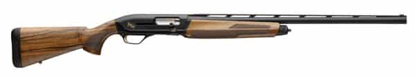 Wooden-stocked shotgun with black barrel and action.
