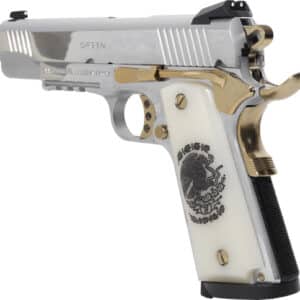 Silver and gold handgun with engraved design