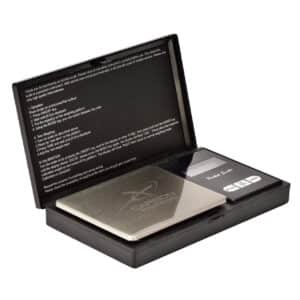 Digital pocket scale in open black case