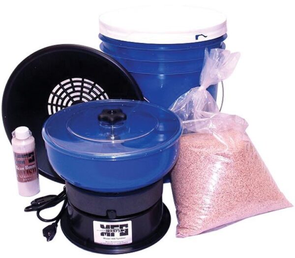 Vibratory tumbler kit with accessories and cleaning media.