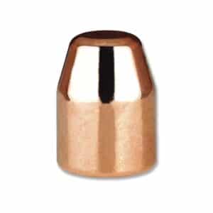 Copper bullet on white background.