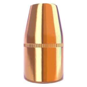 Golden bullet standing upright on white background.