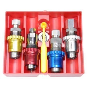 Colorful refrigeration valve tool set in red case.
