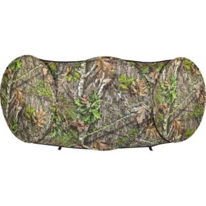 Camouflage hunting blind with forest pattern.