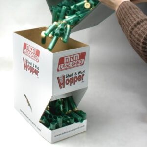 MTM hopper filled with green shells