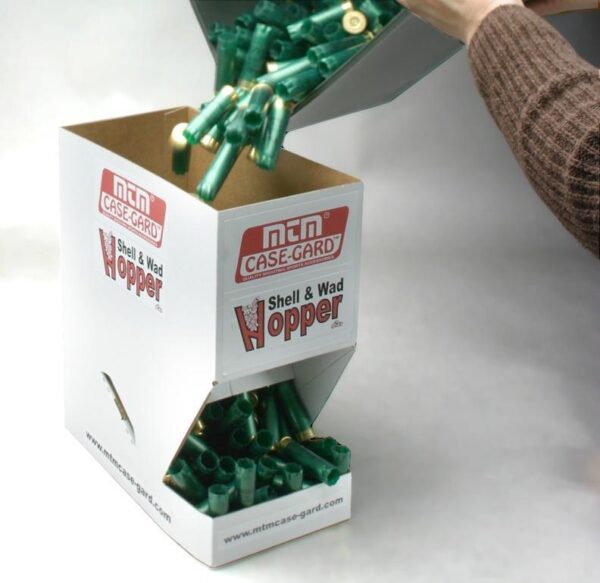 MTM hopper filled with green shells