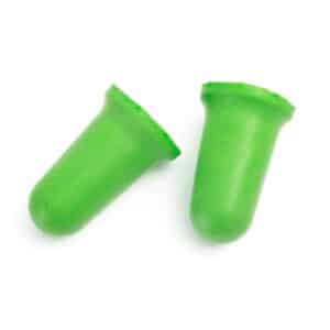 Green foam earplugs on white background.