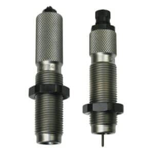 Two metal reloading dies for ammunition.