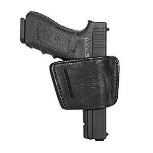 Black gun in leather holster, side view