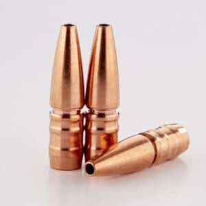 Three copper bullets standing and lying down