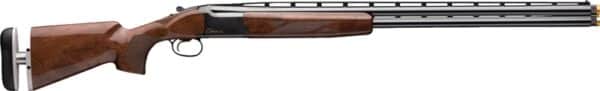 Double-barrel shotgun with wooden stock and metal barrel.