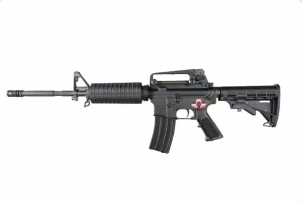 Black assault rifle, side view, white background.