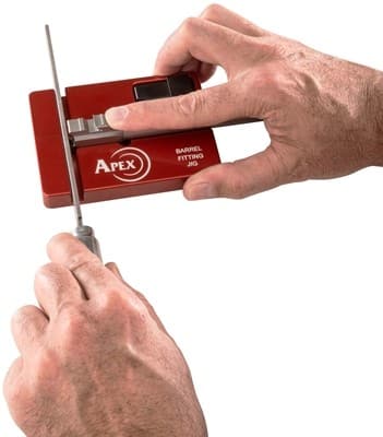 104141ax bbl.jpg Hands using gun barrel fitting tool