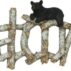 Welcome sign with bears on birch logs