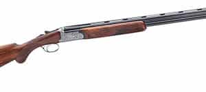 Elegant wooden shotgun with engraved metal details