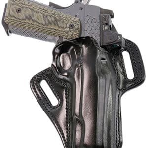 Pistol in black leather holster, side view.
