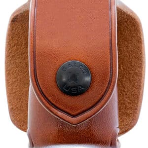 Brown leather holster with snap button closure