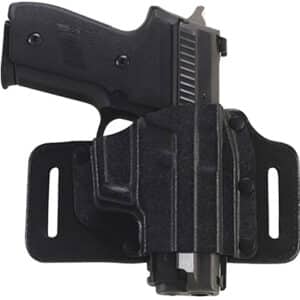 Black pistol in belt holster