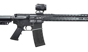 Black AR-15 rifle with optical sight attachment.