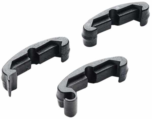 Three black plastic clips for scooter wheels