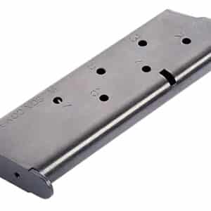 Metal handgun magazine with bullet holes