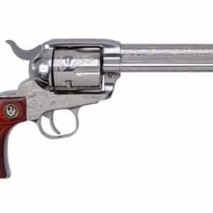 Engraved silver revolver with wooden grip