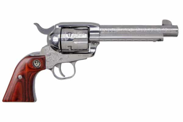 Engraved silver revolver with wooden grip