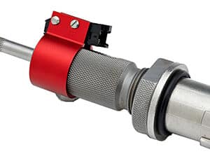 Precision metallic tool with textured handle and components.