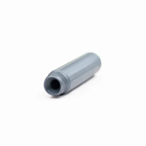 Gray plastic tube connector on white background
