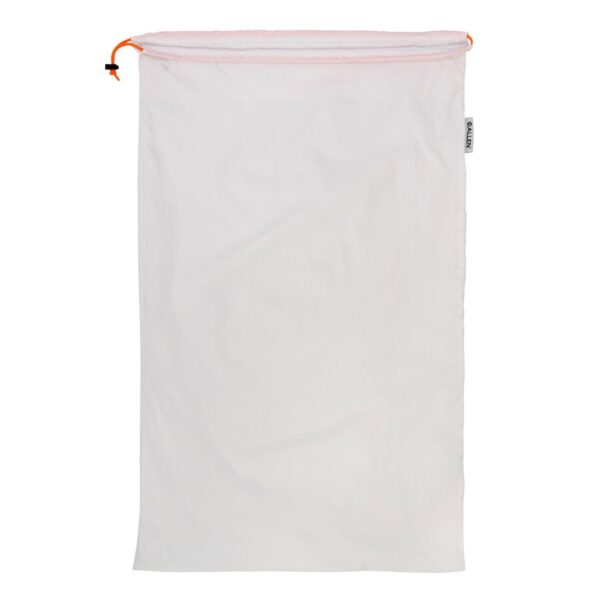 White drawstring laundry bag with label.