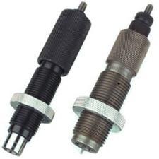 Two precision metal dies for reloading ammunition.