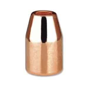 Copper bullet close-up on white background.