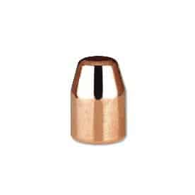 Copper bullet standing upright on white background.