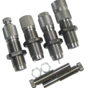 Four reloading dies and accessories on white background.