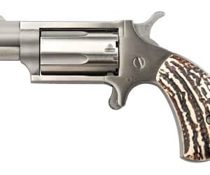 Revolver with engraved ivory handle, side view.