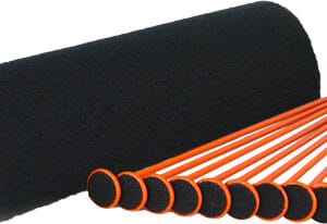 Black drum pad roll and orange mallets