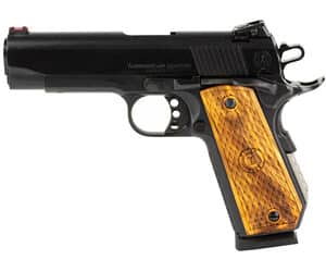 Black handgun with wooden grip on display
