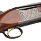 Engraved shotgun with wooden stock close-up