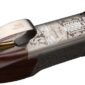 Engraved shotgun with intricate metalwork and wood finish.