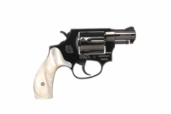 Black revolver with white handle