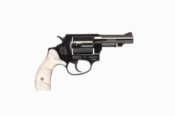 Revolver with pearl grip and black barrel