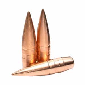 Three copper-colored bullet tips stacked together.