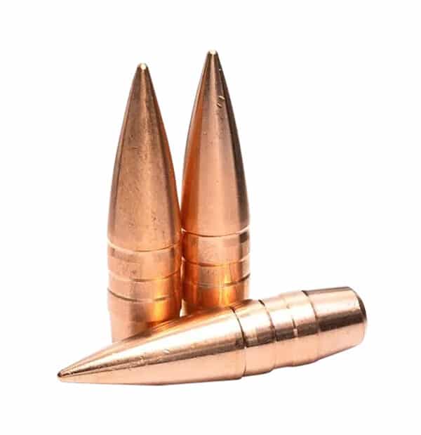 Three copper-colored bullet tips stacked together.