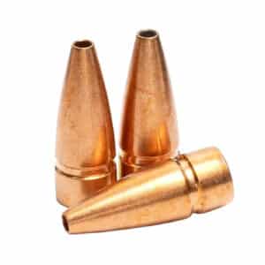 Three copper bullets on white background