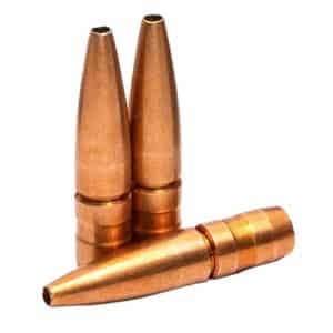 Copper bullets on white background.