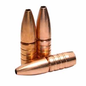 Three copper-colored bullet casings isolated on white background.