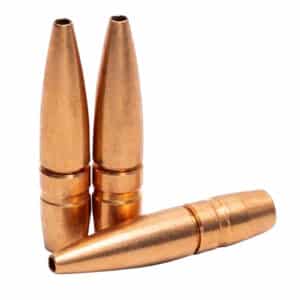 Three copper bullets standing upright