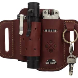 Leather EDC organizer with tools and keys.