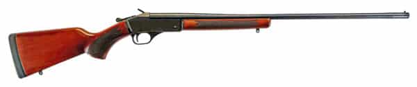 Wooden hunting rifle with barrel and trigger visible.