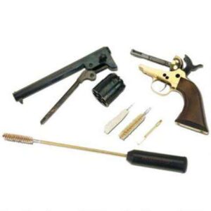 Disassembled revolver cleaning kit with tools.